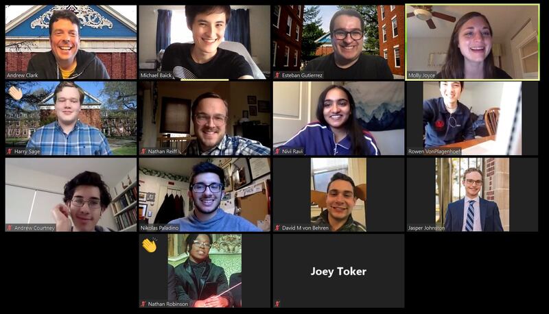 A screen shot gallery view from a Zoom call shows a grid with seventeen video squares. The people in the squares are Harvard Glee Club singers, staff, and composer Molly Joyce.